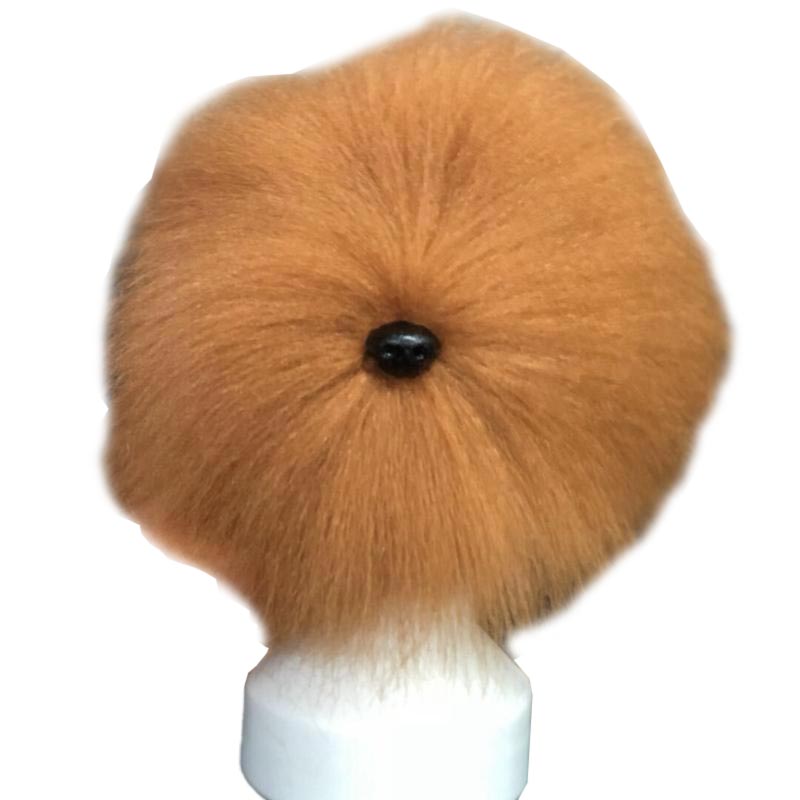 Apricotfarbener  Haarteil zum Üben des Stylings von Hundeköpfen